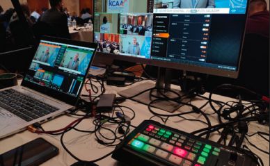 Multilingual broadcast control desk with live feeds